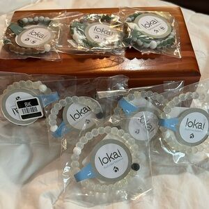 8 Lokai Bracelets. 4 Youth L, 1 Youth M, 3 Youth S. NWT. Dead Sea Mt Everest